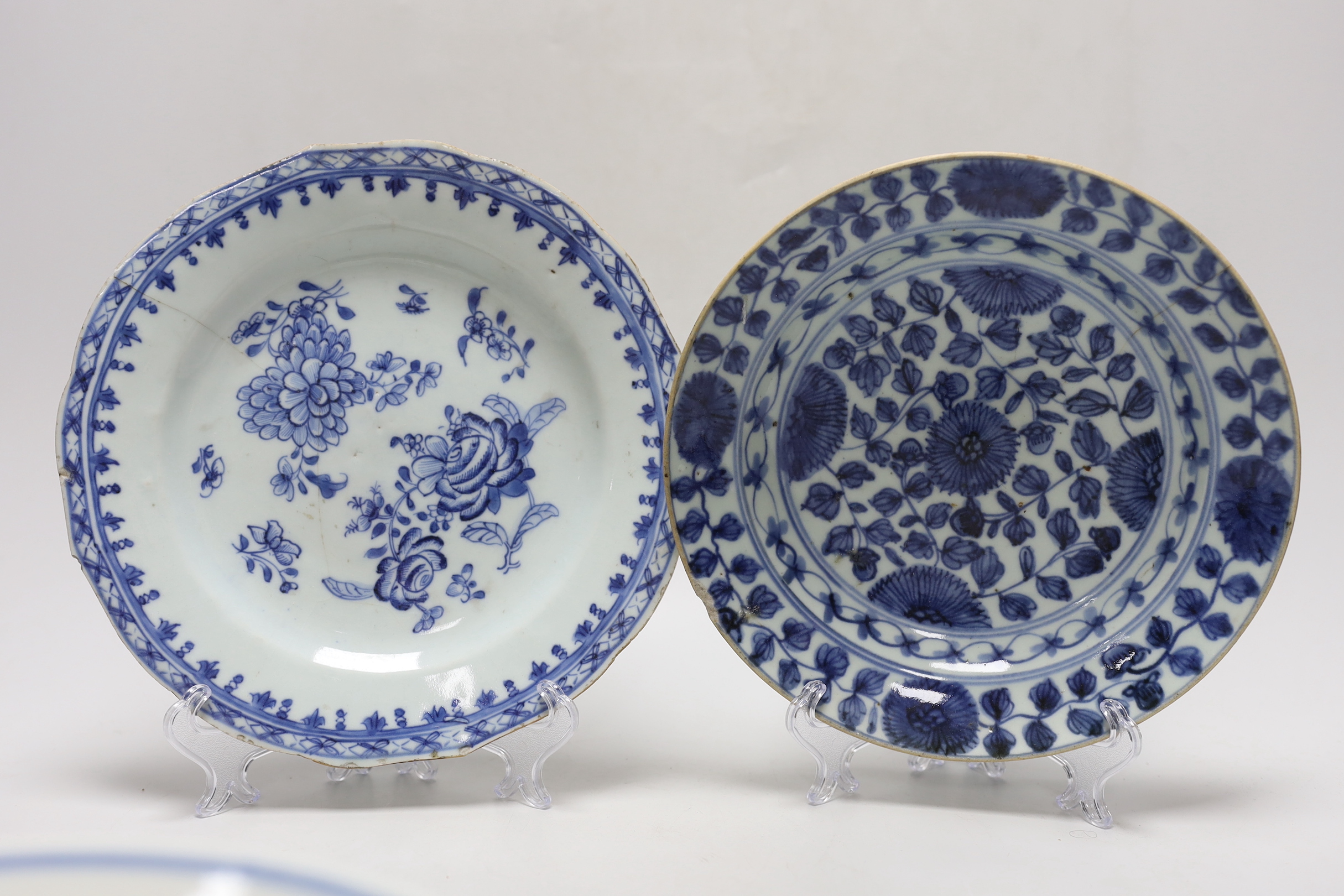 A Chinese blue and white ‘boys’ bowl and two blue and white flower plates, largest 24cm diameter